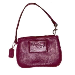 Coach Burgundy Purple leather wristlet clutch with textured finish